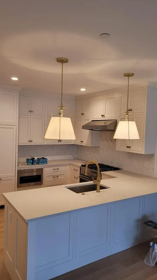 Island pendants and recessed lights, a Storm Electrical job in Massachusetts