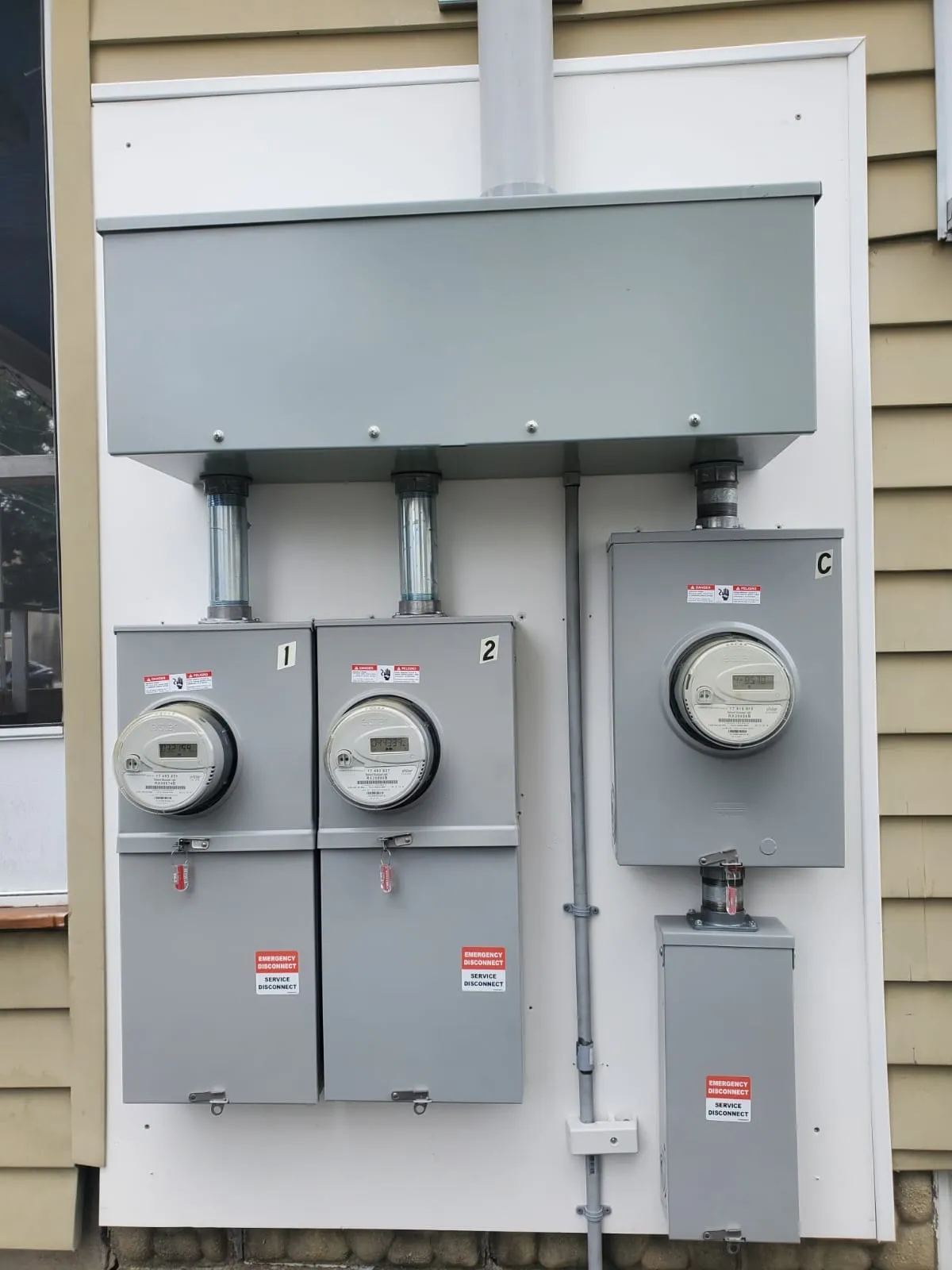 Three meters fed from a trough, a Storm Electrical job in Massachusetts