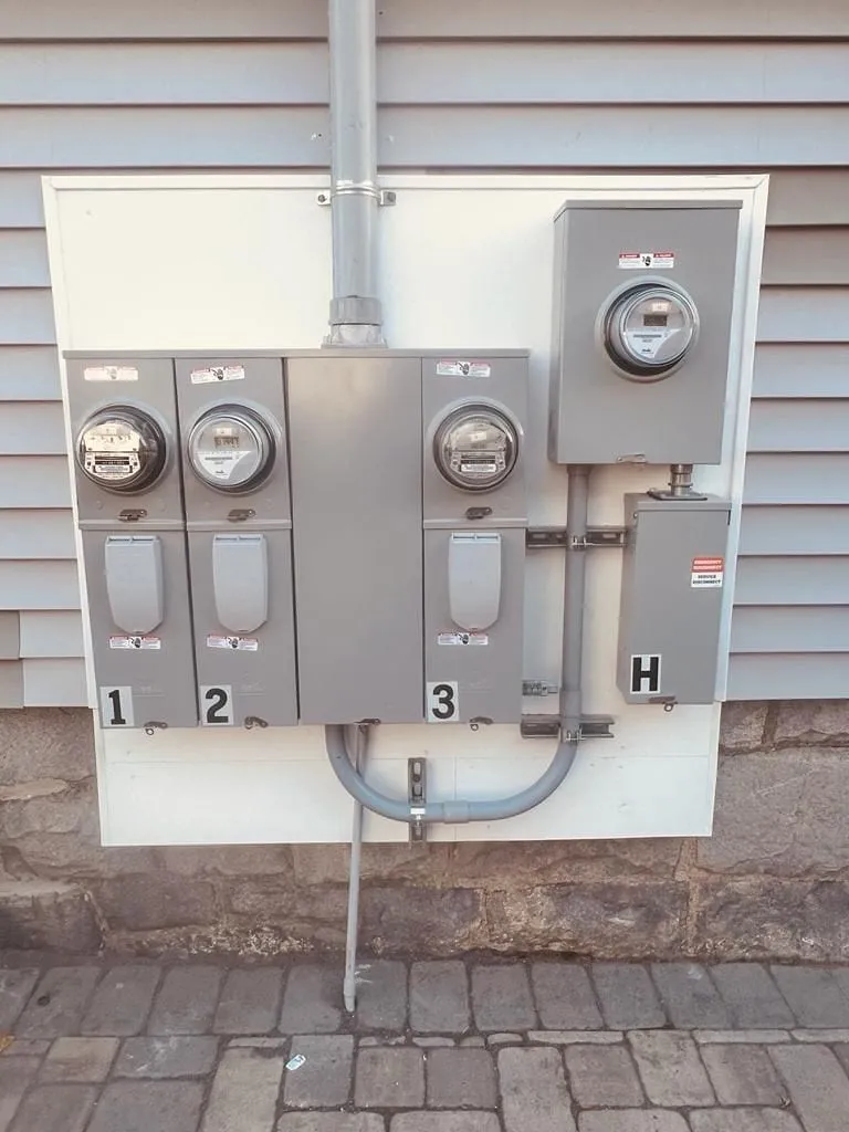 Meter bank with house meter, a Storm Electrical job in Massachusetts