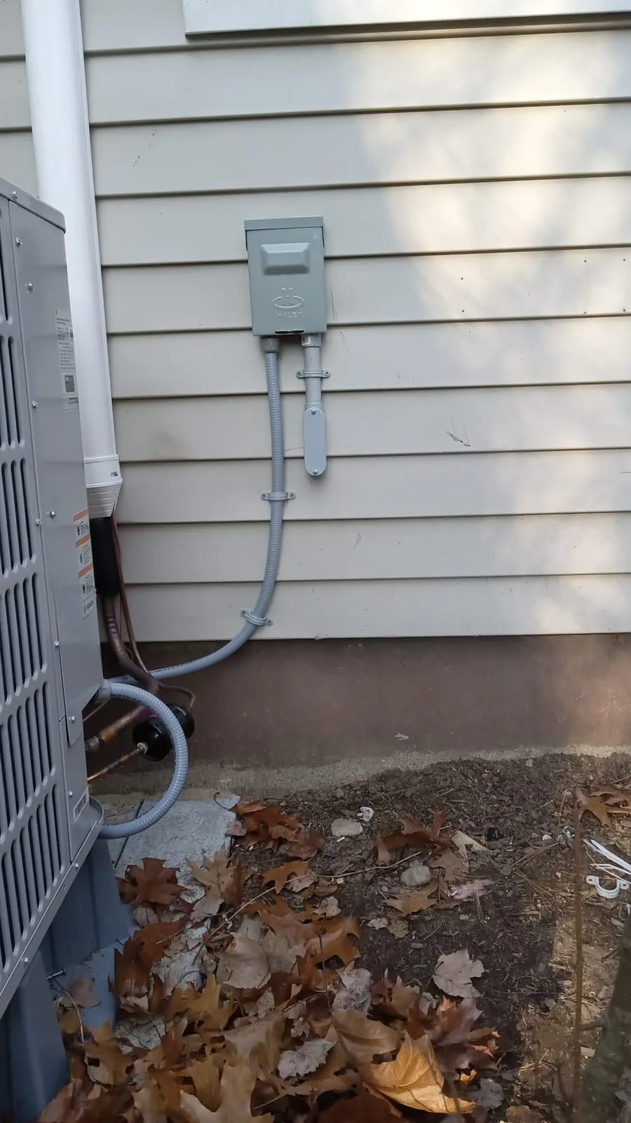 Exterior disconnect on siding, a Storm Electrical job in Massachusetts