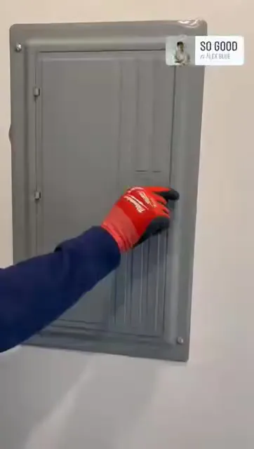 Opening a panel for inspection, a Storm Electrical job in Massachusetts